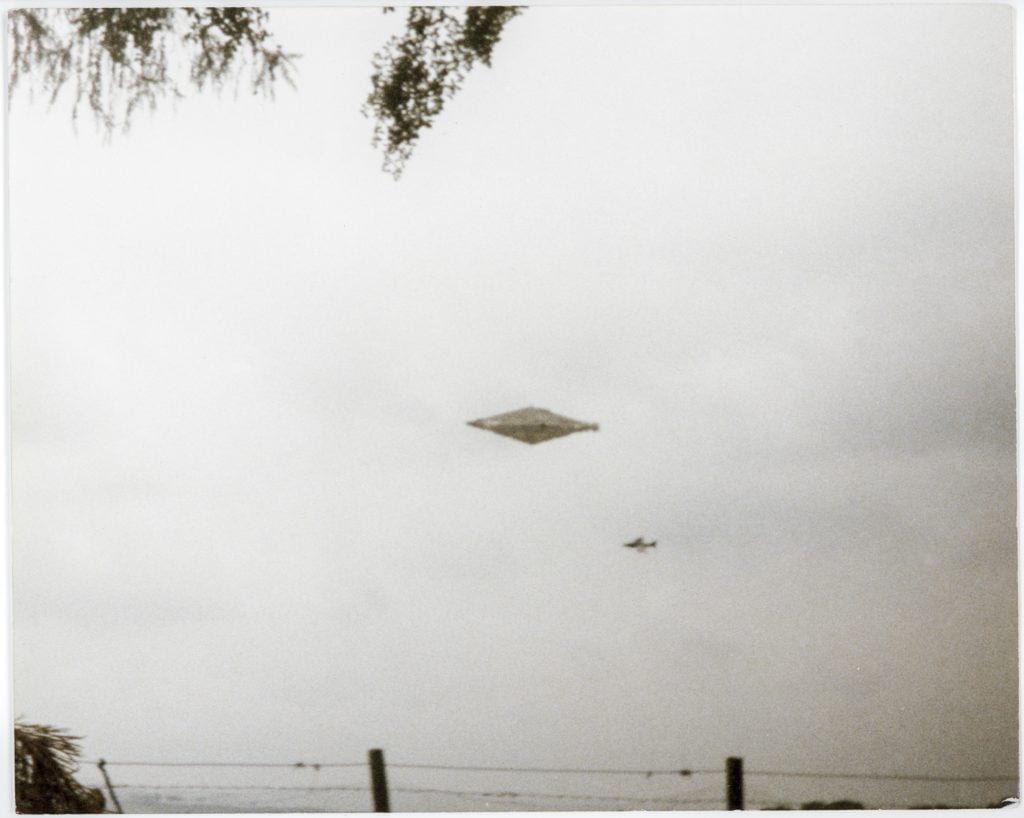 The Scottish UFO image - what appears to be a diamond shaped ship in a cloudy grey sky