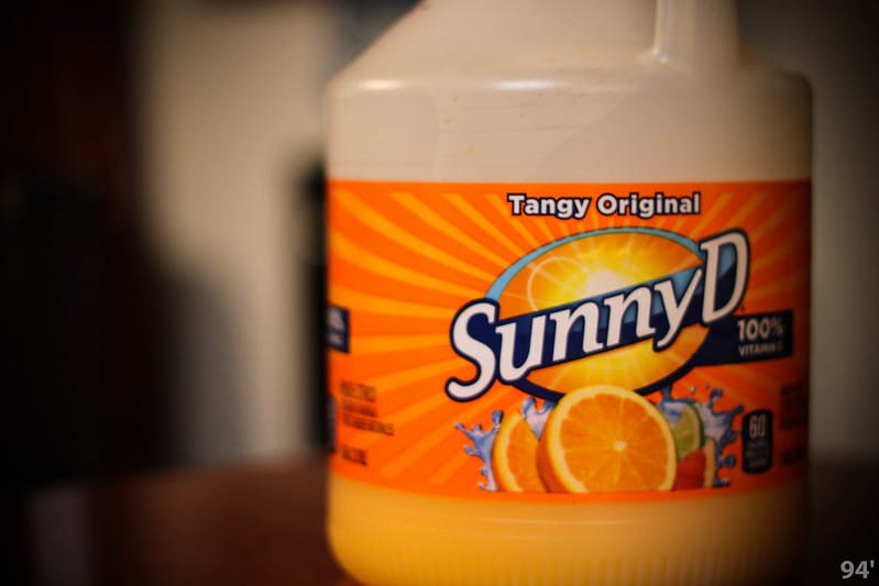 A large bottle of 'Sunny D' tangy original flavour (formerly Sunny Delight), an orange-flavoured juice drink.